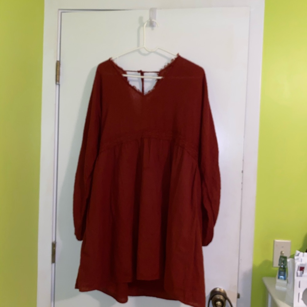 Never been worn . Rust babydoll dres
